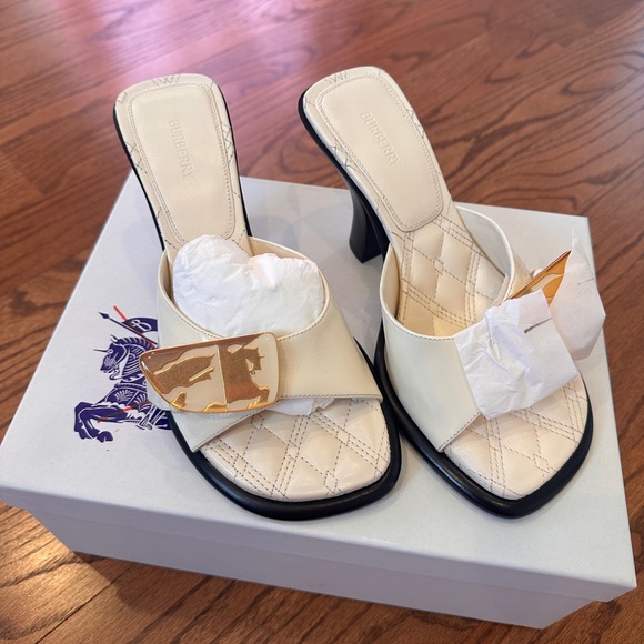 Burberry Shoes - Burberry Ivory Heeled Mules with Gold Accent
